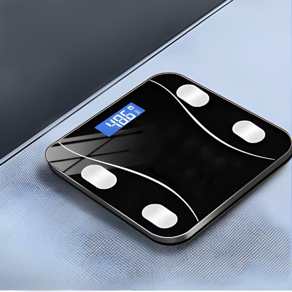 Balança digital Nomanni multifuncional com medição de composição corporal, plataforma resistente em vidro temperado e leitura rápida e confiável.
