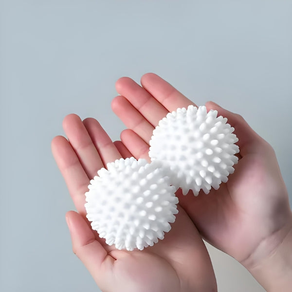 Bolas amaciadoras reutilizáveis para máquina de lavar roupas, ideais para reduzir fiapos, pelos e odores sem uso de produtos químicos.
