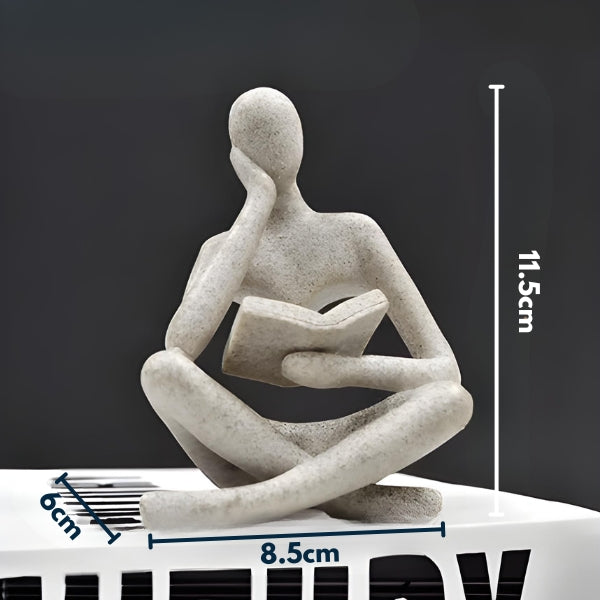 Decoração artística moderna que transmite reflexão, foco e elegância em ambientes internos.