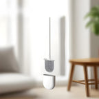 Escova sanitária Nomanni SlimBrush com design inovador, suporte fixável na parede e cerdas de silicone que não danificam o vaso.