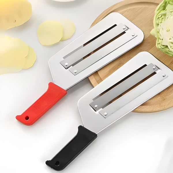 Fatiador ProCorte Inox com lâmina dupla em aço inoxidável, ideal para cortar legumes com precisão e facilidade na cozinha.