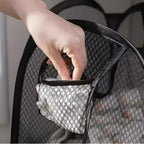 O Cesto Dobrável AirMesh Nomanni oferece praticidade e organização, com design compacto e material respirável que evita umidade nas roupas.
