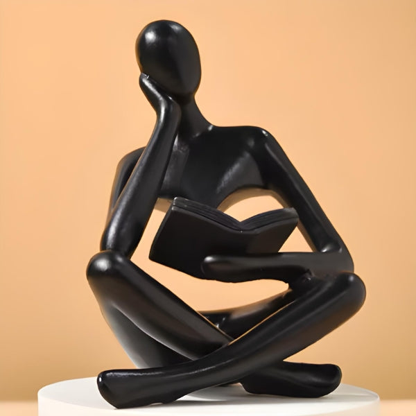 Objeto decorativo intelectual em resina de alta qualidade para ambientes sofisticados e modernos.