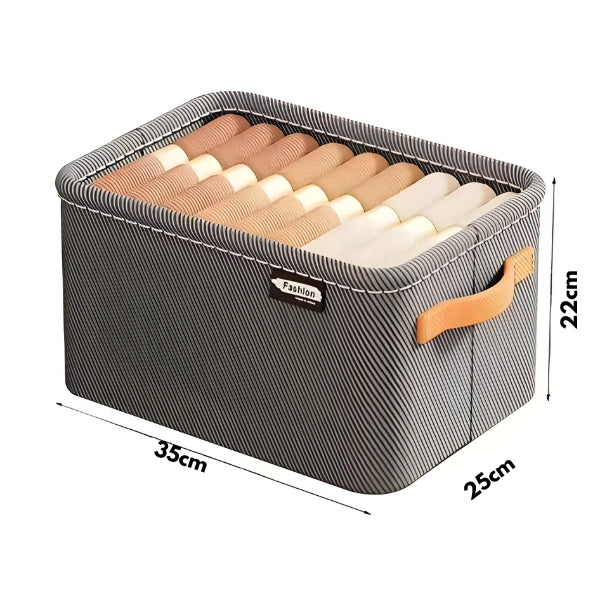 Organizador de roupas dobrável com alça, ideal para closets e gavetas. Armazene roupas íntimas e camisetas com praticidade e estilo.