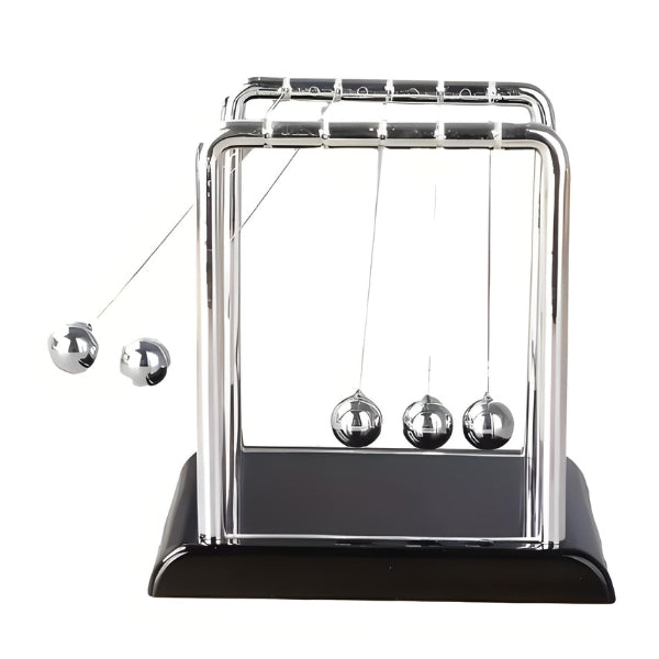 Pêndulo decorativo Newton aplicado em escritório e home office, agregando elegância, equilíbrio visual e um toque intelectual ao ambiente.