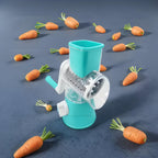 Ralador GiroChef Nomanni 3 em 1 com design ergonômico, ideal para fatiar, ralar e moer legumes com eficiência na cozinha.