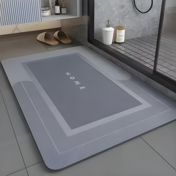 Tapete para banheiro com base antiderrapante e absorção rápida. Ideal para uso ao lado do box, mantendo o piso seco e seguro.